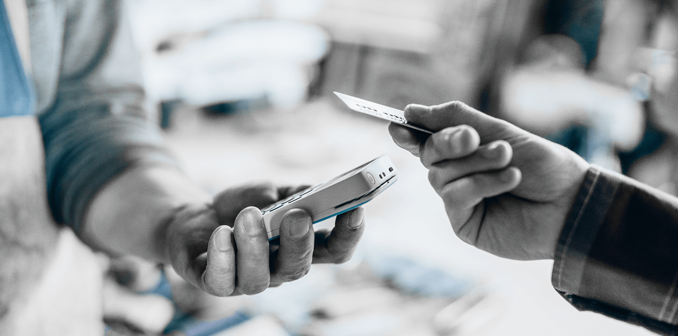A person making a purchase with their card