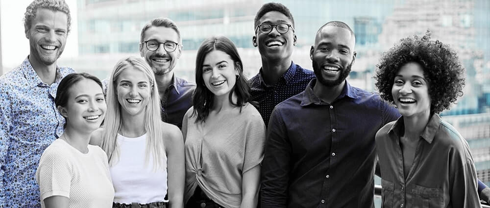 Group of employees smiling