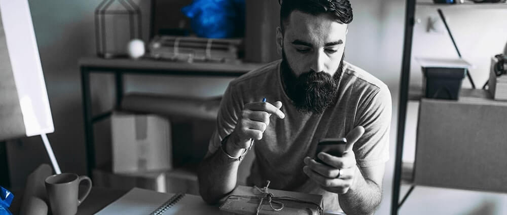 Man doing banking on his phone